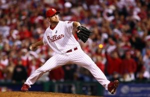 PHILADELPHIA - OCTOBER 21: Brad Lidge #54 of the Philadelphia Phillies throws a pitch against the Los Angeles Dodgers in Game Five of the NLCS during the 2009 MLB Playoffs at Citizens Bank Park on October 21, 2009 in Philadelphia, Pennsylvania. (Photo by Chris McGrath/Getty Images)